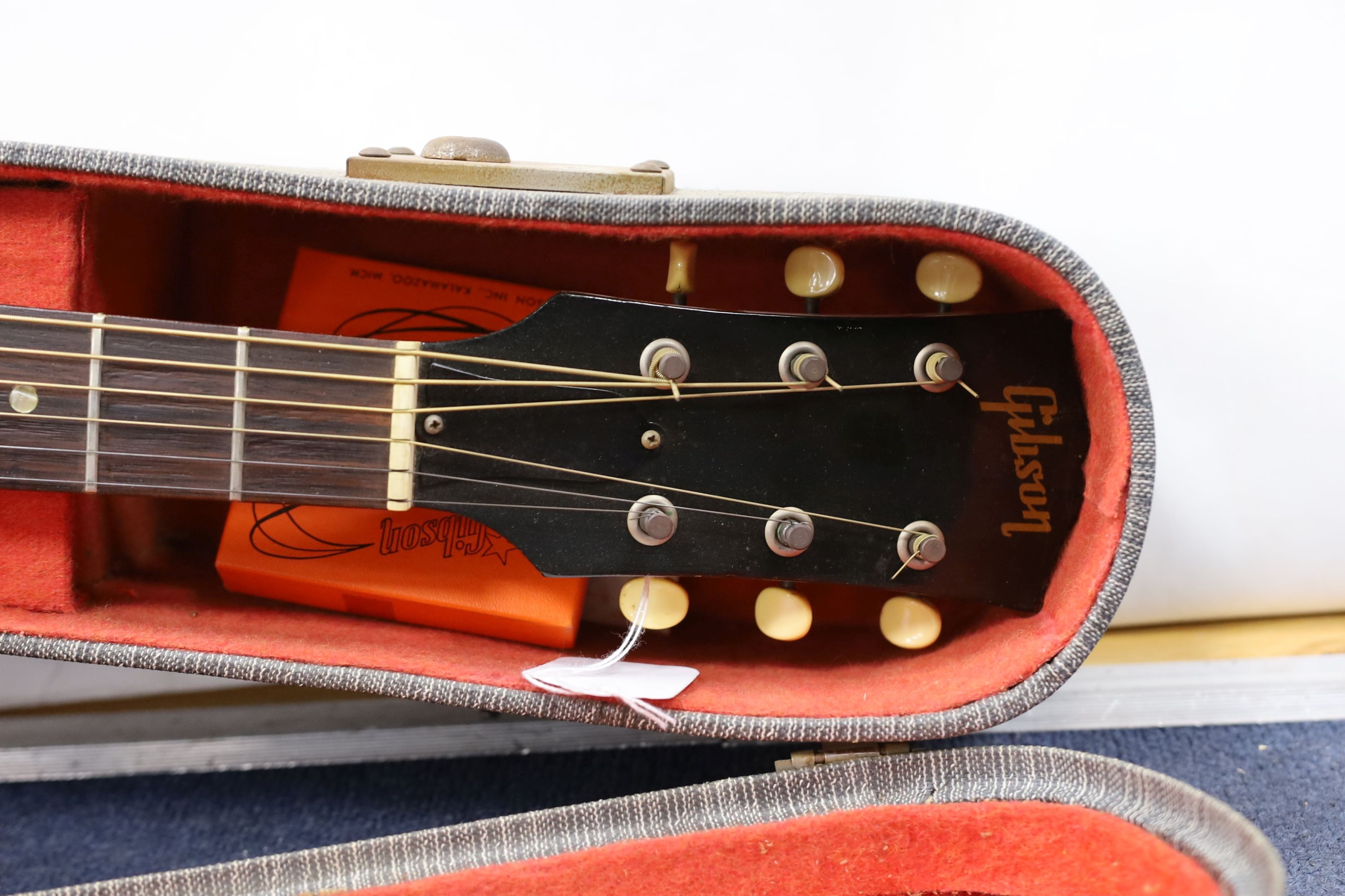 A Gibson acoustic guitar in hard case, serial no. 430 862